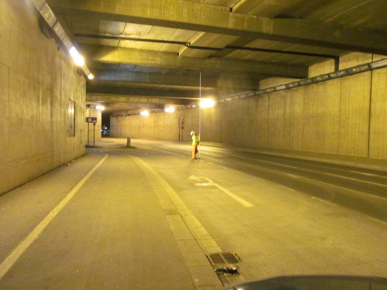 Workers in the tunnel under the Frenchgate Centre at night.
